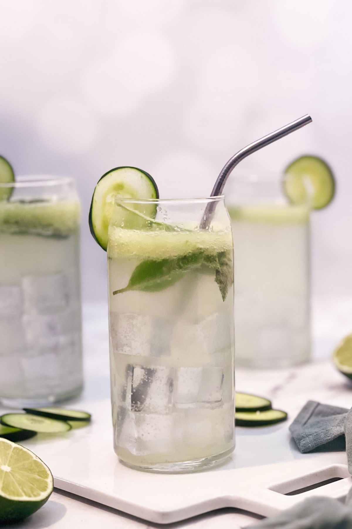 cucumber basil spritzers on a white backdrop. 