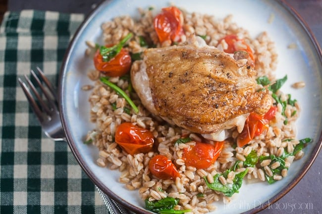 Chicken Thighs with Farro and Burst Tomatoes