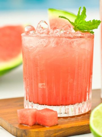 Watermelon mocktail with fresh mint and lime by the pool.