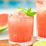 Watermelon mocktail with fresh mint and lime by the pool.