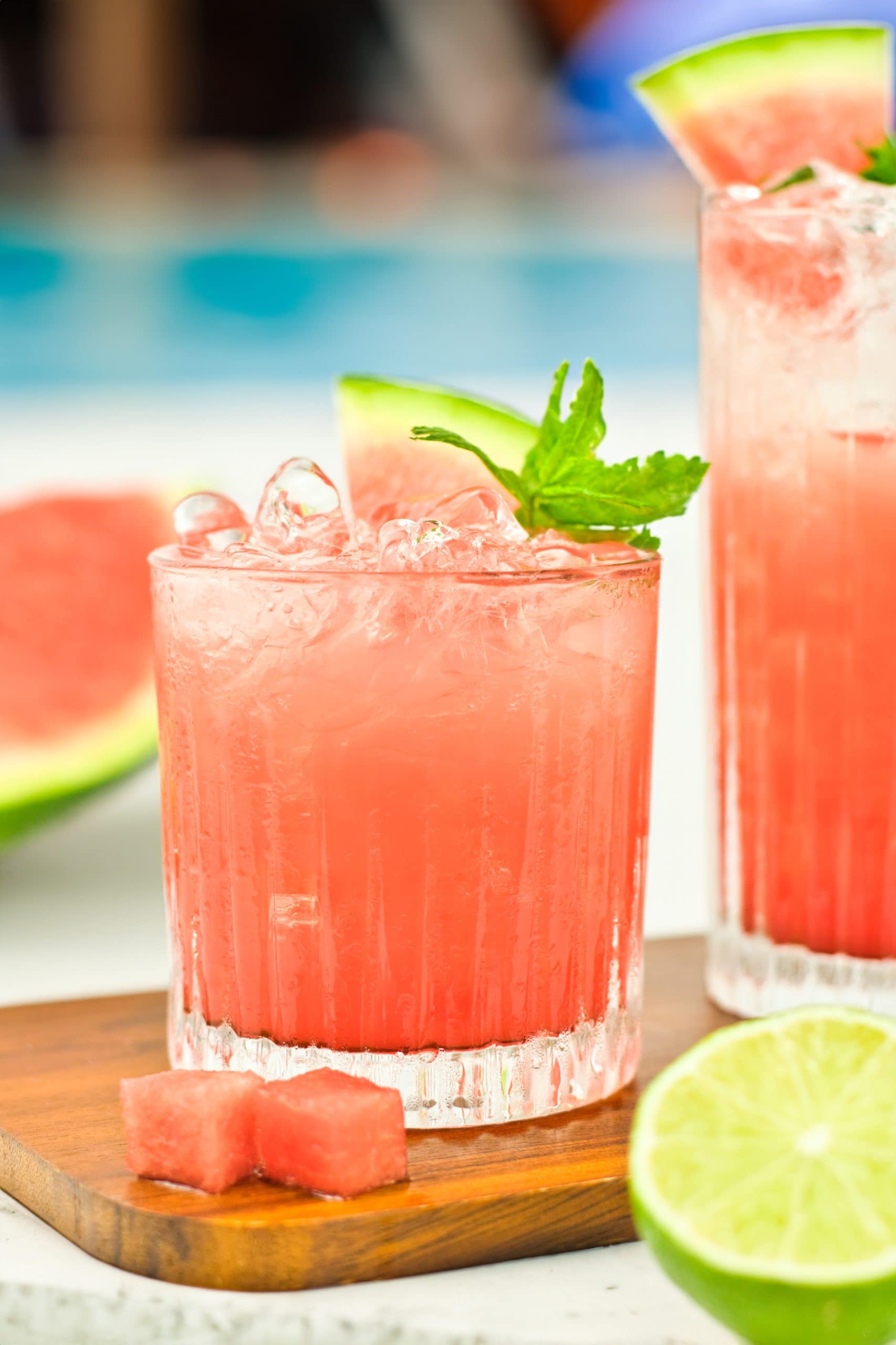Watermelon mocktail with fresh mint and lime by the pool. 