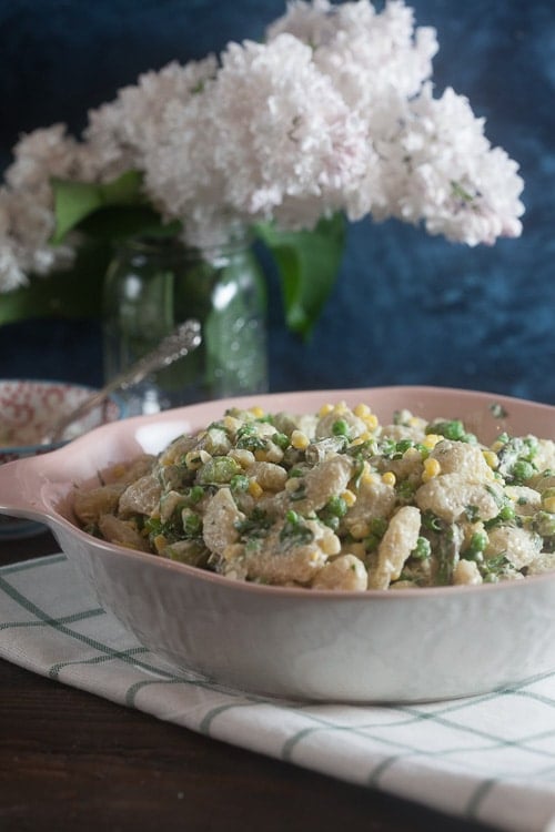 This summer, give pasta salad an upgrade with gnocchi! This gnocchi salad is loaded with crunchy spring vegetables and tossed in a creamy parmesan herb dressing.