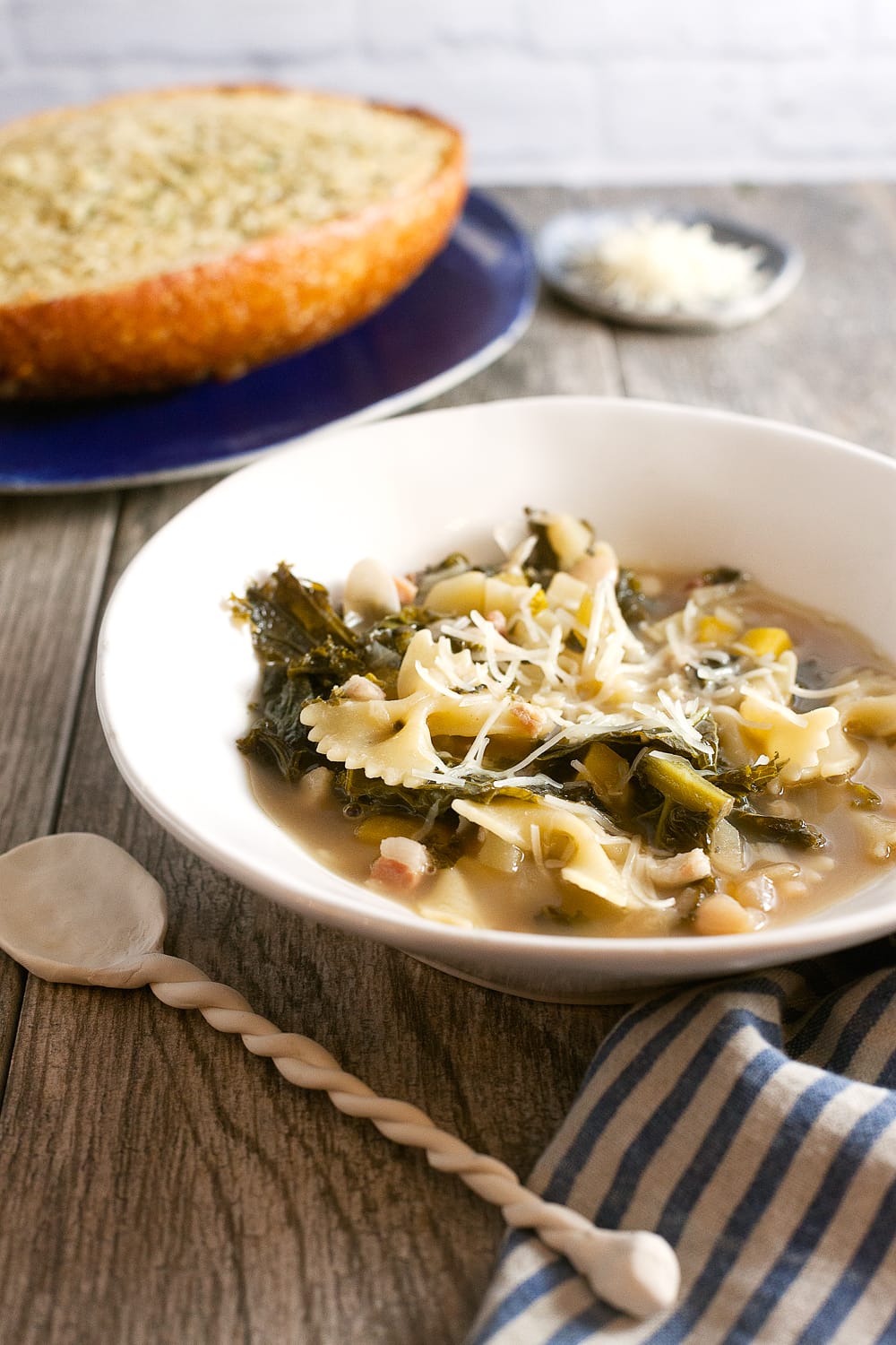 White bean and kale soup is the answer to your springtime cold. You’ll want to slurp it straight from the bowl!