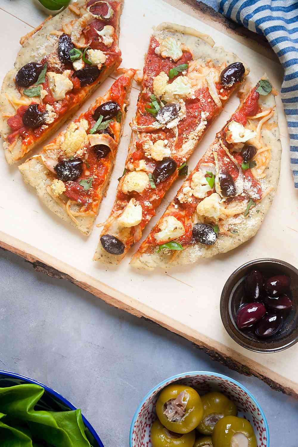 "Cheese on Bottom" Pizza with Fennel, Cauliflower, and Olives
