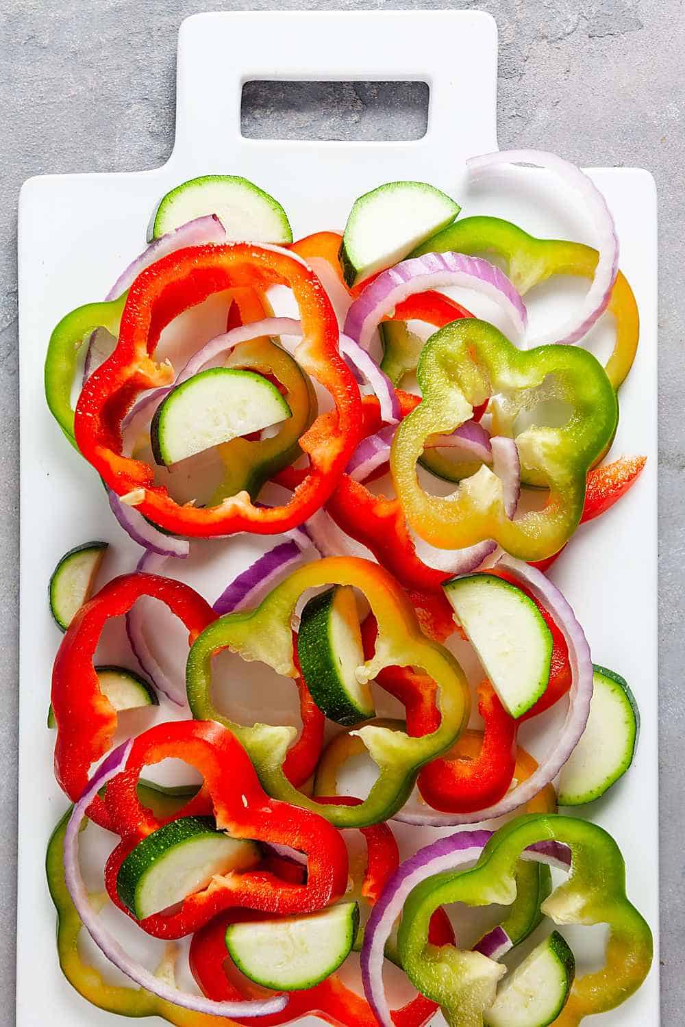 Sliced peppers, onion, and zucchini
