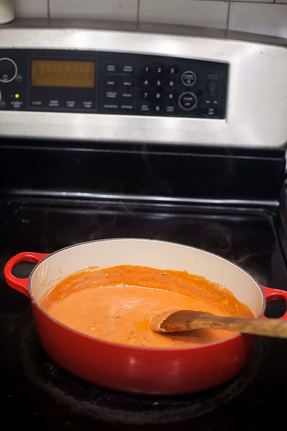 Homemade Pink Sauce simmering in a pot