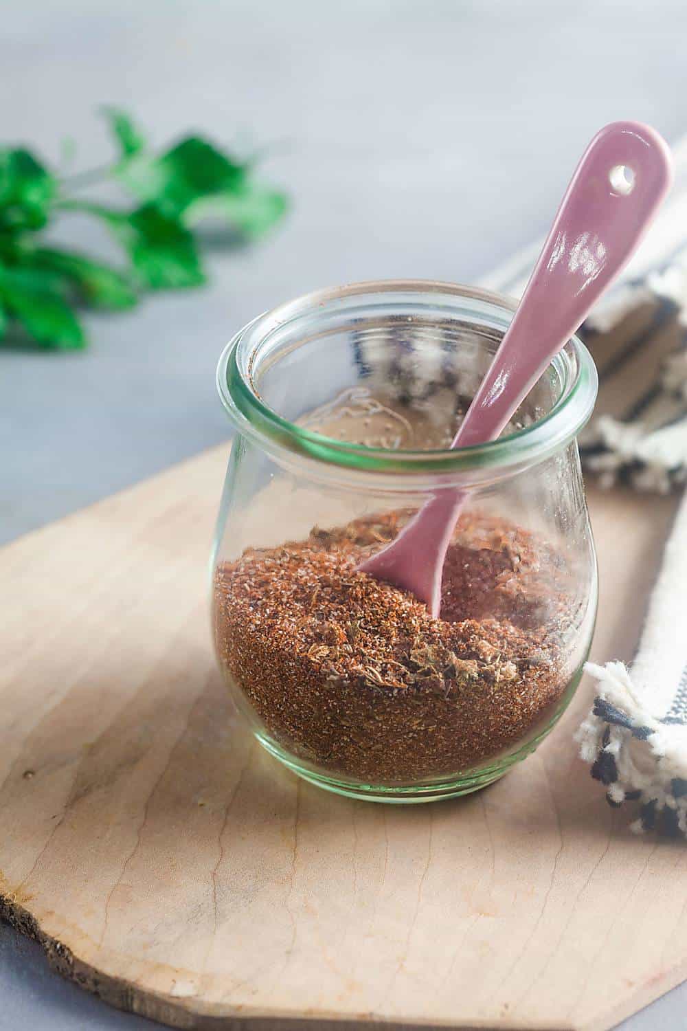 Homemade Cajun seasoning in a glass jar