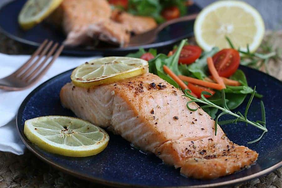 Perfect salmon fillets are easy to make - just pull out your air fryer! The healthy recipe is seasoned simply with lemon and garlic so you can enjoy the salmon plain or as part of other recipes. This method of cooking salmon is practically foolproof - you'll never want to cook it in a pan again!