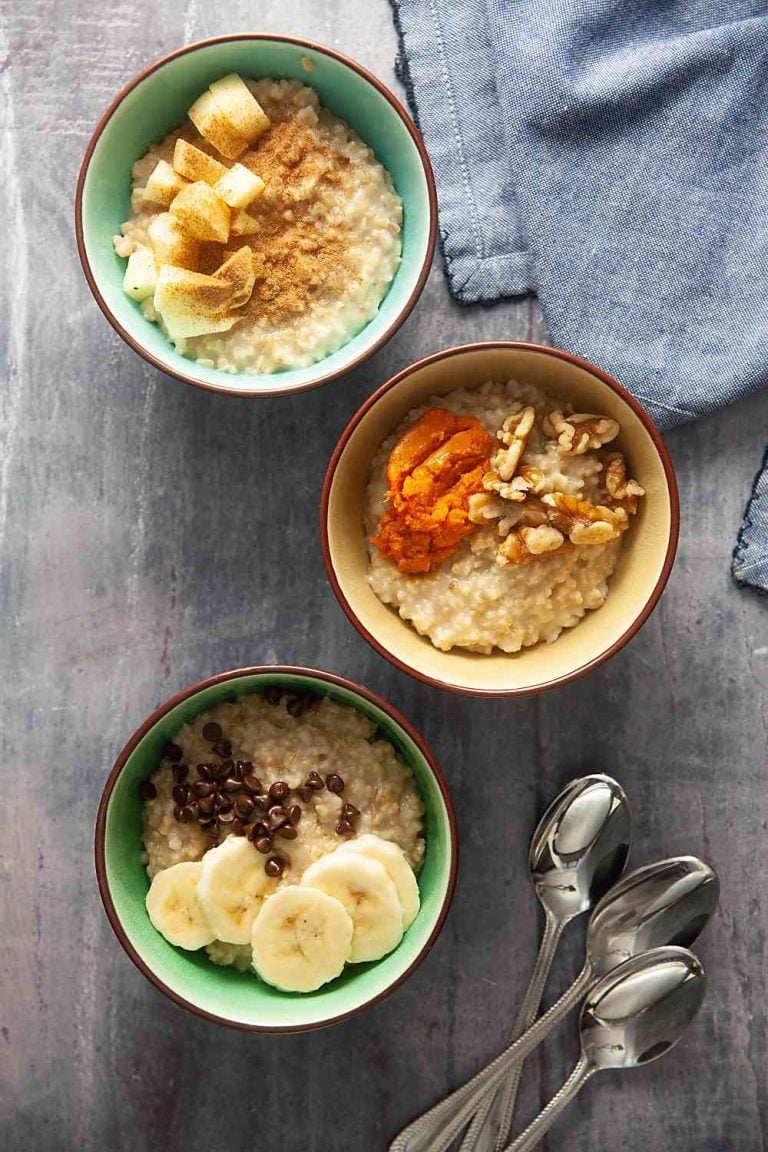 three bowls of instant pot steel cut oats with various toppings