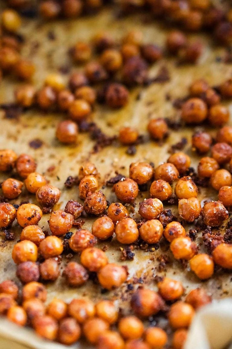 crunchy chickpeas snack with buffalo seasoning on a baking sheet