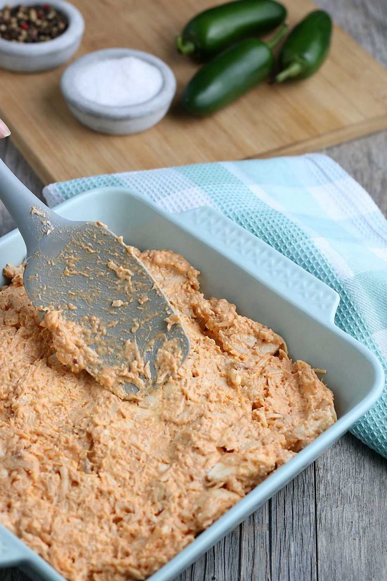 One the Buffalo chicken dip ingredients are mixed together, spread them into a casserole dish or add them to you slow cooker