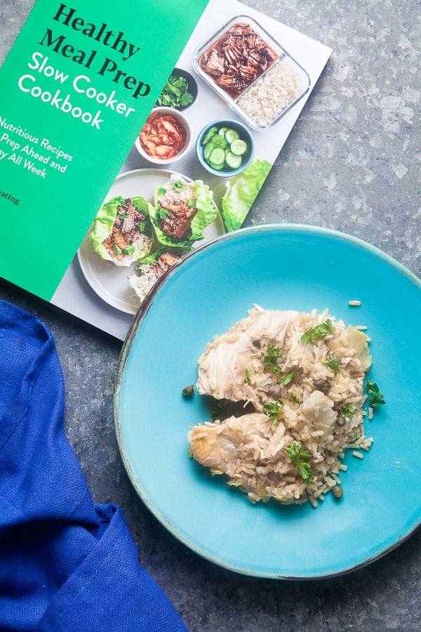 slow cooker lemon chicken next to a copy of the Healthy Meal Prep Slow Cooker Cookbook