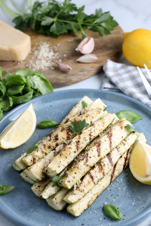 grilled zucchini on a blue plate