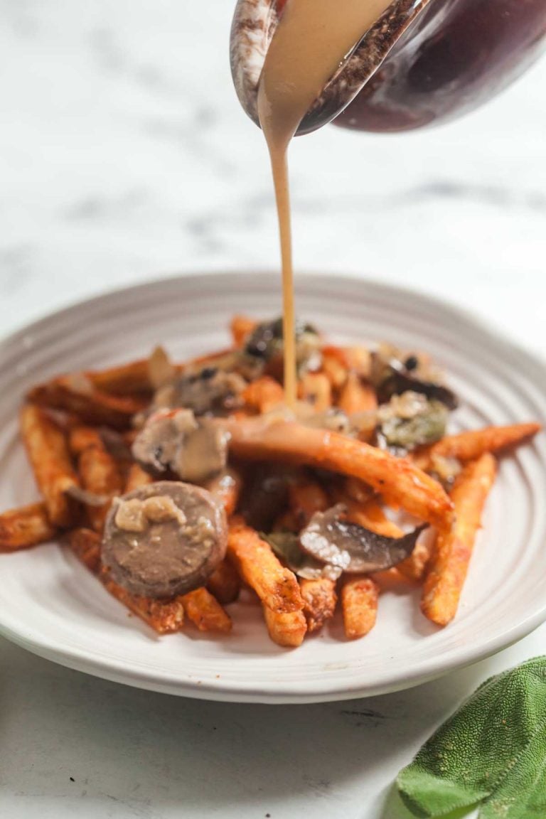 Pour mushroom gravy onto a plate of french fries to make vegetarian poutine. 