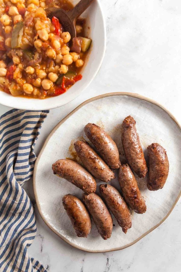 A platter of beef loukaniko sausage and eggplant stew.