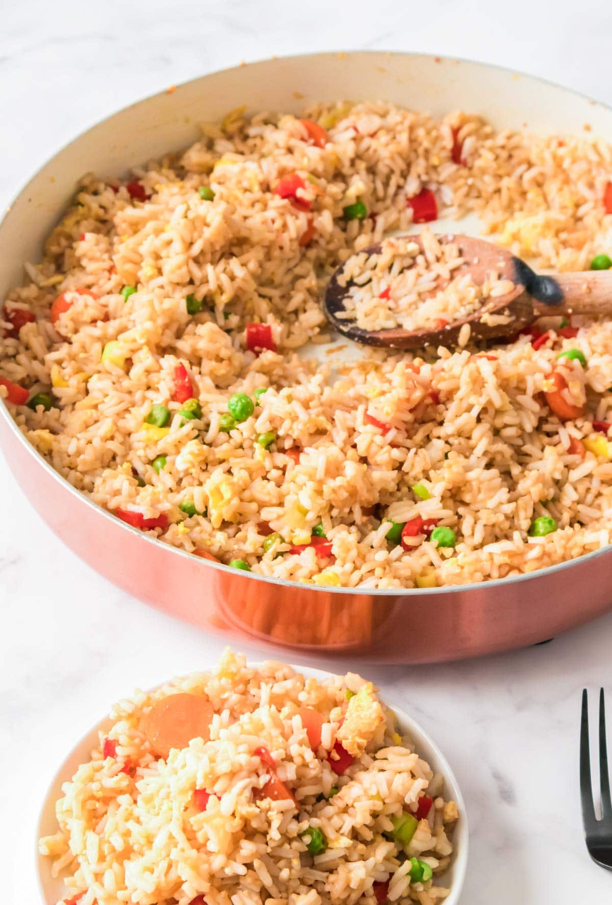 A pan of homemade fried rice, ready to serve for a quick and easy dinner. 
