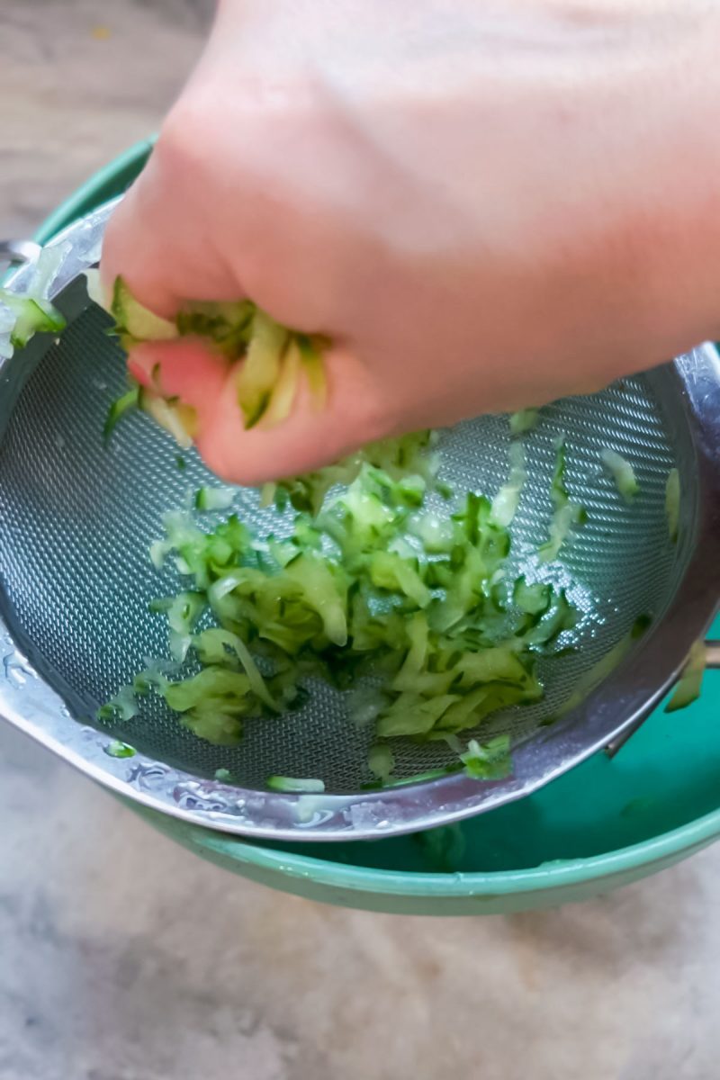 If you're wondering how to make tzatziki sauce, the key is to squeeze the extra water from the cucumber before adding it to the rest of the ingredients. 