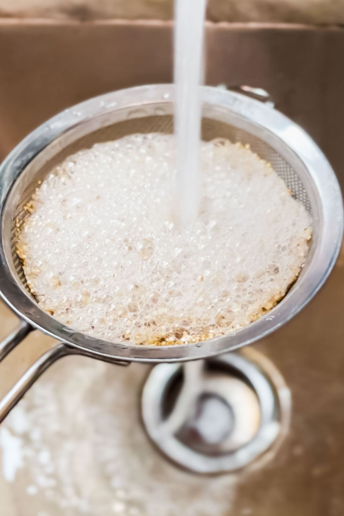 Rinsing  quinoa before cooking to prevent it from taking on a bitter flavor. 