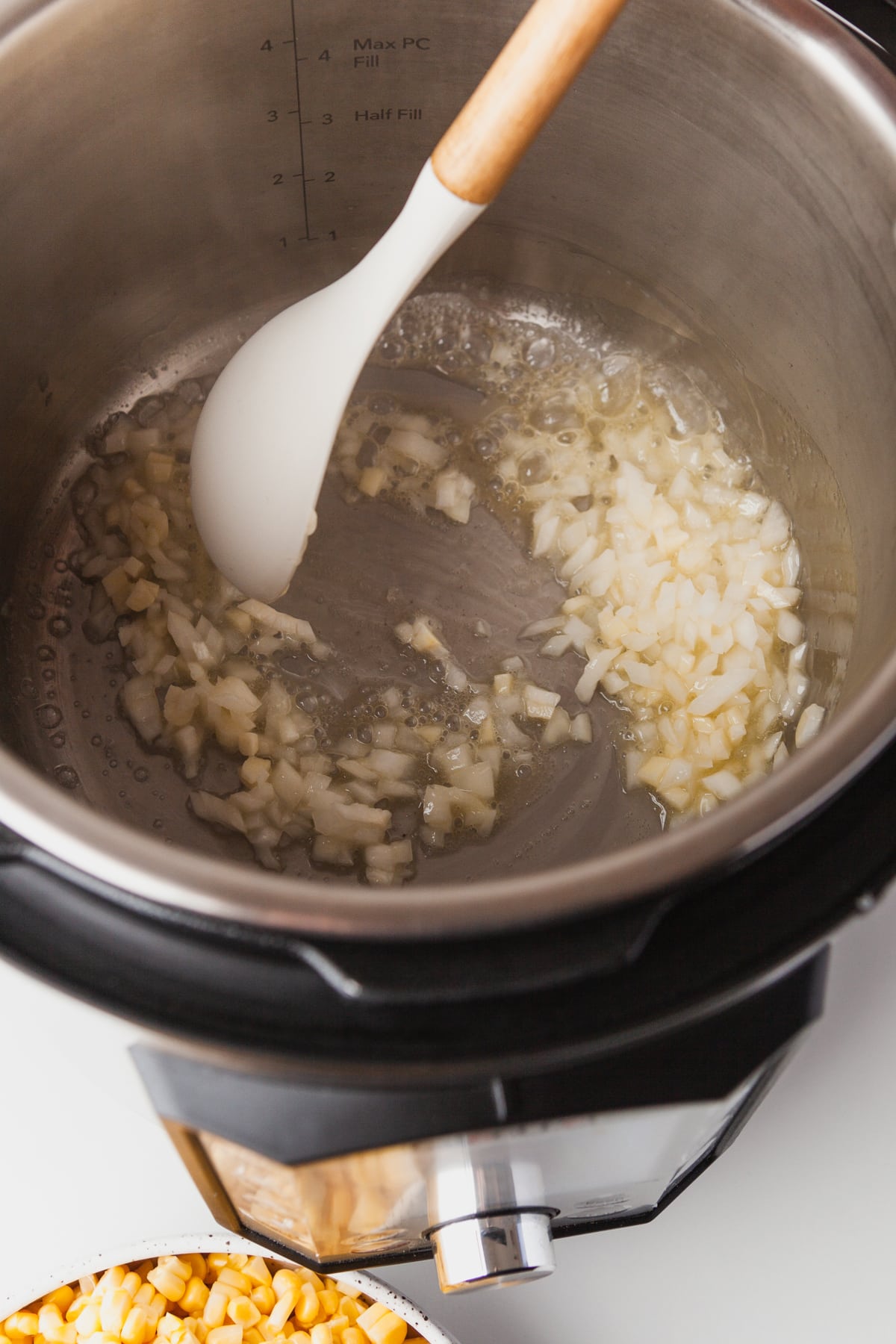 Sautee onion and garlic in your pressure cooker. 