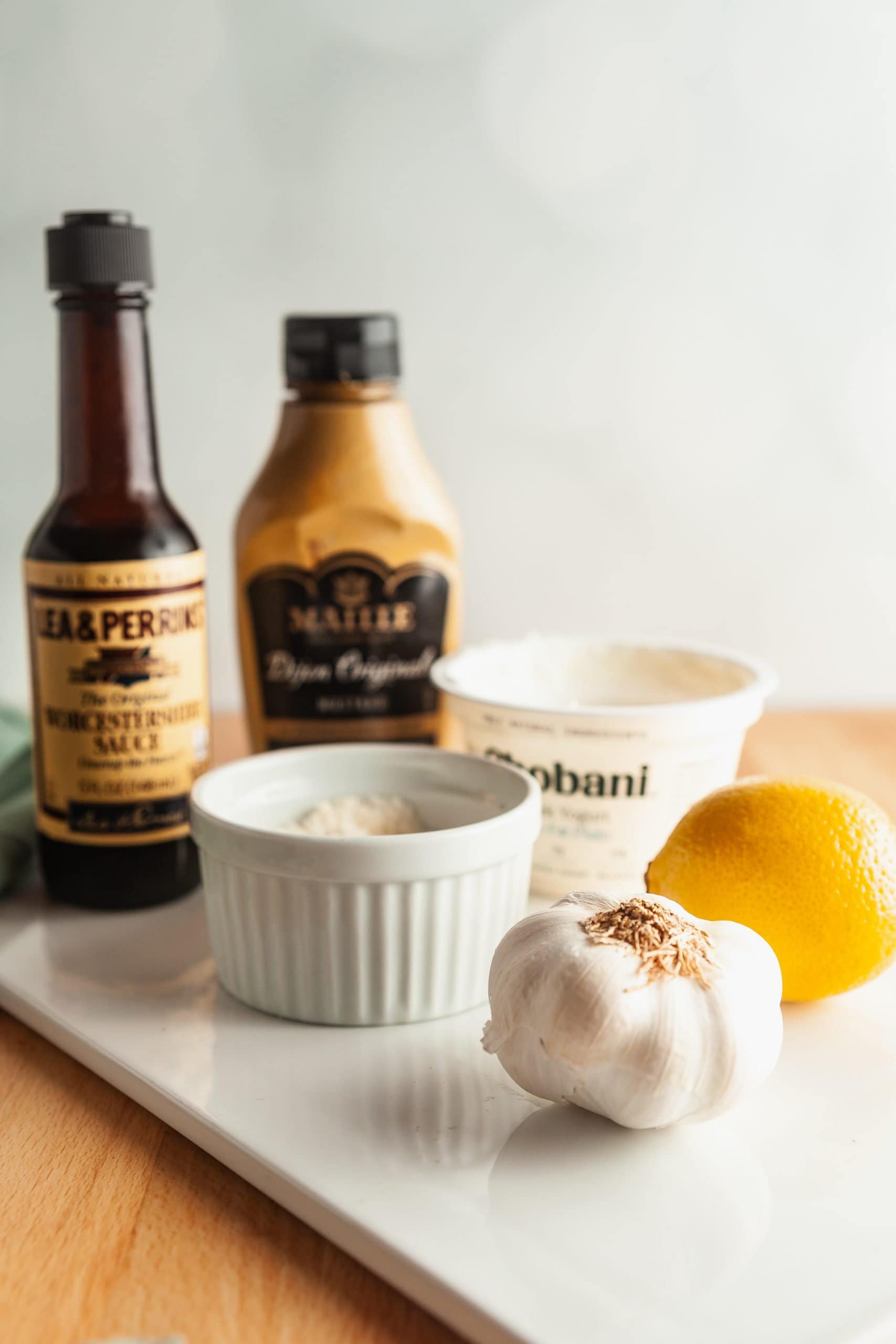 Ingredients needed to make healthy Caesar dressing without anchovies. 