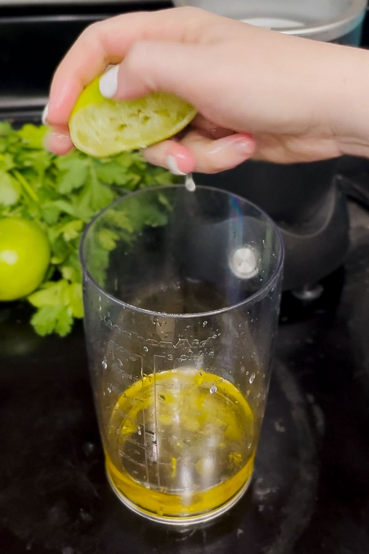Squeezing in lime juice. 