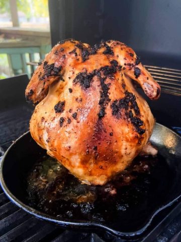 Wine can chicken on the grill.