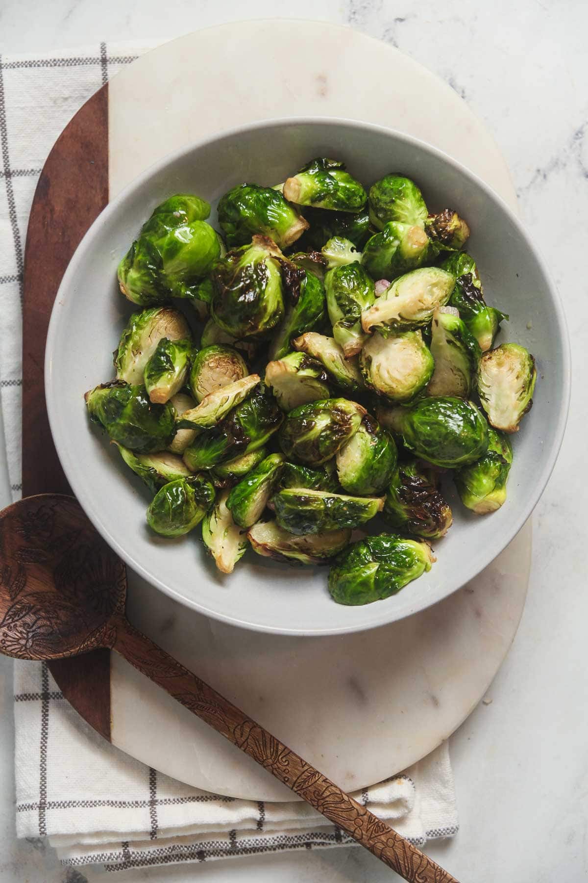 Crispy air fryer Brussels sprouts in a serving dish. 