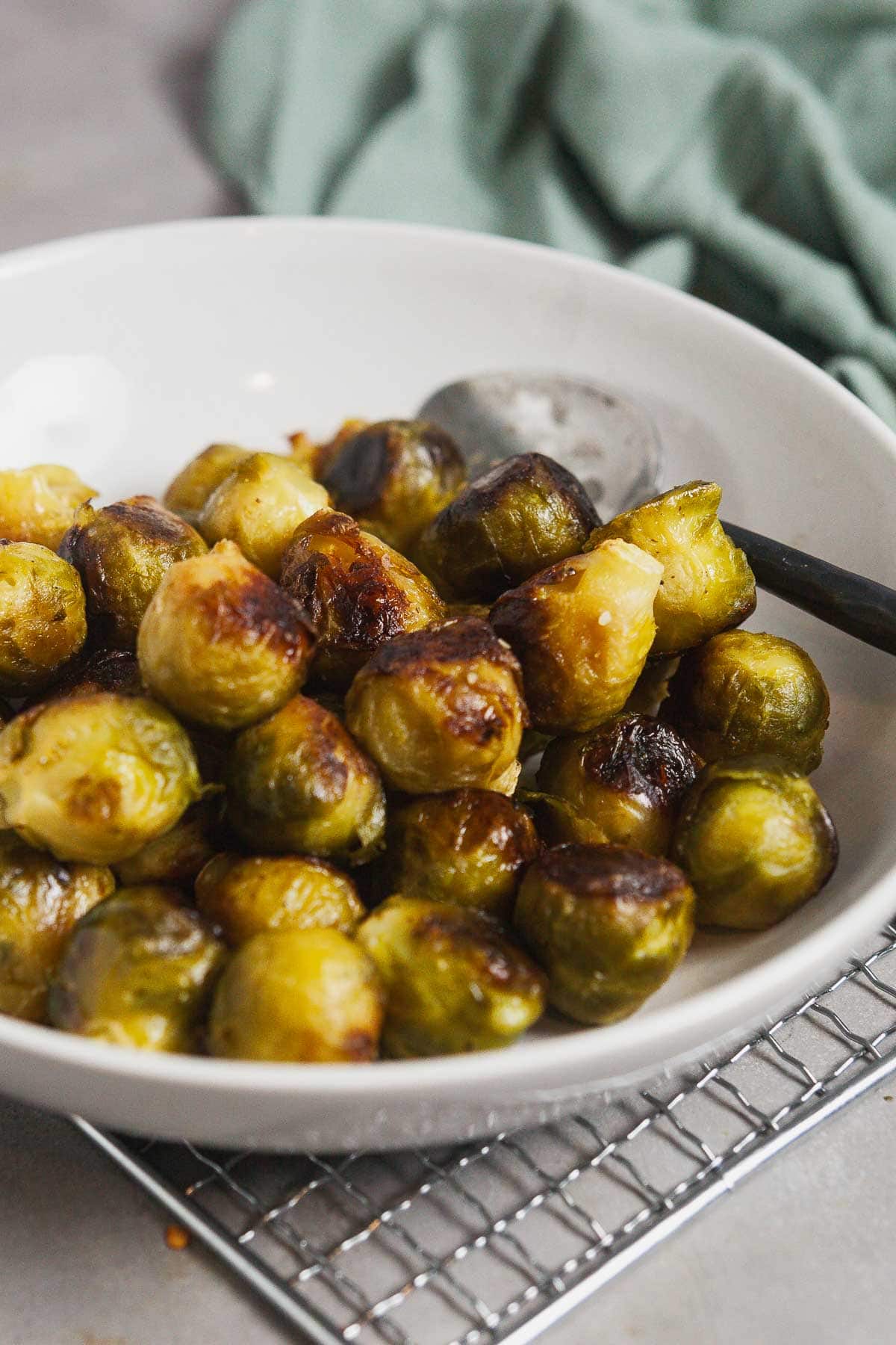 Close up view of roast frozen Brussels sprouts in a bowl. 