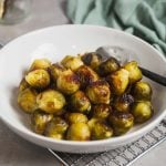A bowl of roasted brussel sprouts.